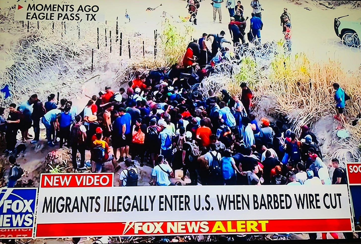 Migrants rush ashore from the Rio Grande into Texas after Border Patrol Agents cut barbed wire installed by the state. (Sep 25, 2023)