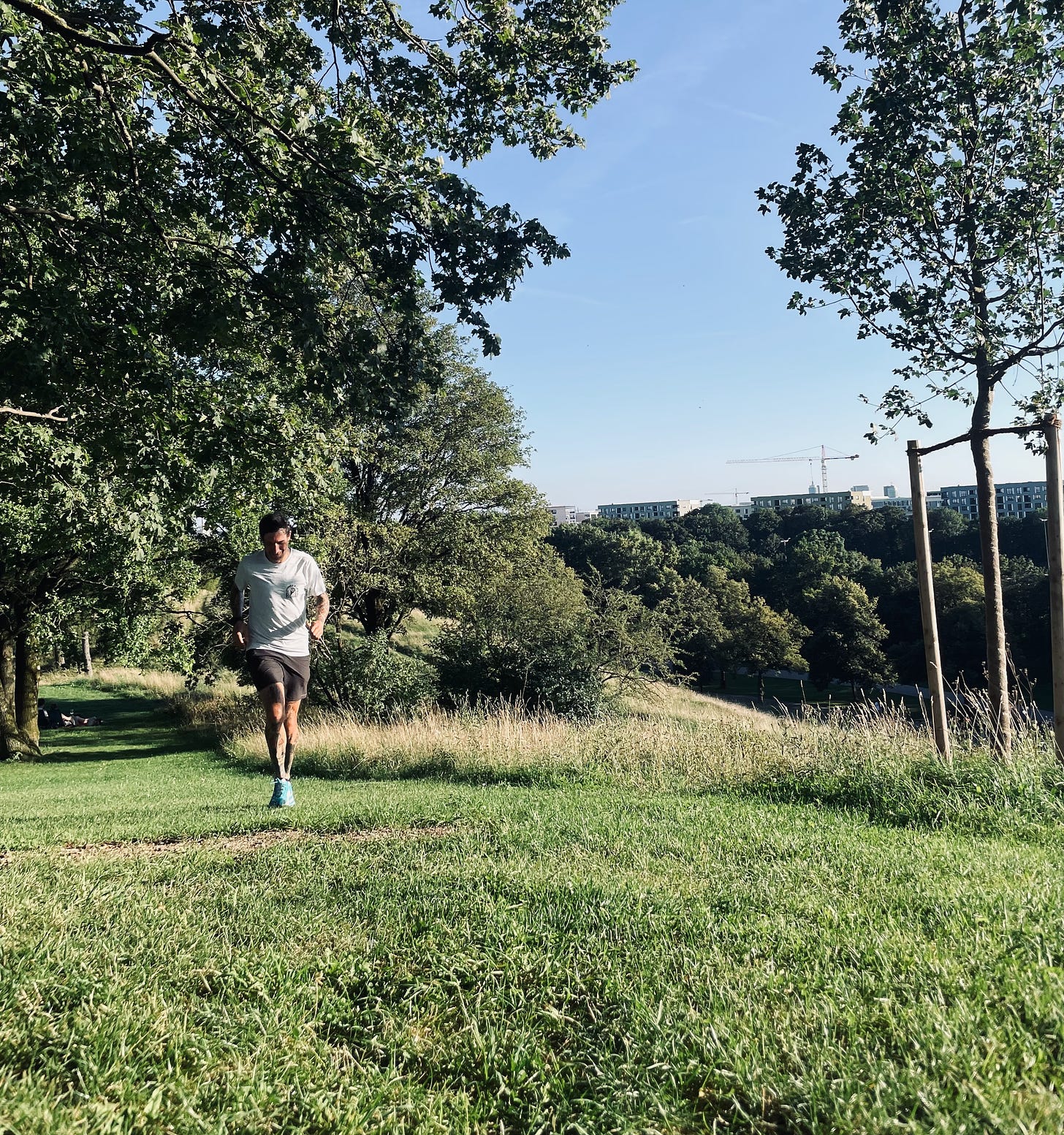 The author running up a grass hill