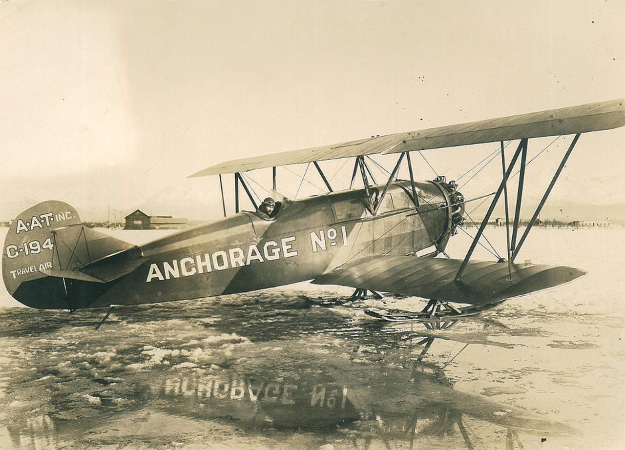 Russ Merrill in his Travel Air floatplane. (Courtesy Alaska Aviation Museum)