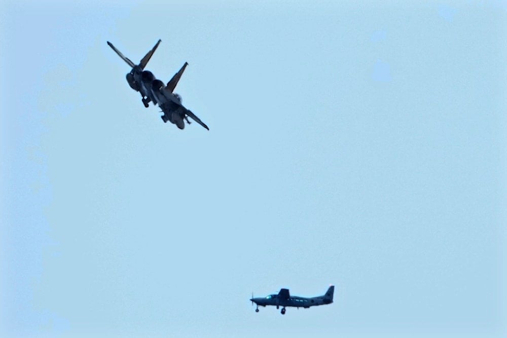 An Israeli fighter jet flies over a Lebanese airforce Cessna plane during the funeral ceremony of Hezbollah leaders Sayyed Hassan Nasrallah and Sayyed Hashem Safieddine in the Sports City Stadium in Beirut, Lebanon, Sunday, Feb. 23, 2025 (AP) An Israeli fighter jet flies over a Lebanese airforce Cessna plane during the funeral ceremony of Hezbollah leaders Sayyed Hassan Nasrallah and Sayyed Hashem Safieddine in the Sports City Stadium in Beirut, Lebanon, Sunday, Feb. 23, 2025 (AP)