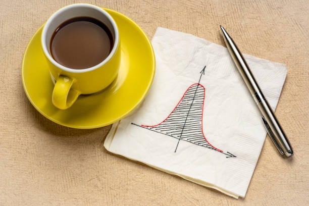 Gaussian (bell) curve on napkin stock photo