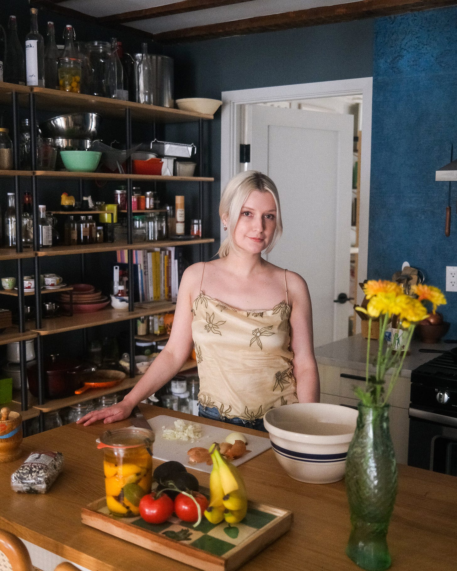 Portrait of author in kitchen. 