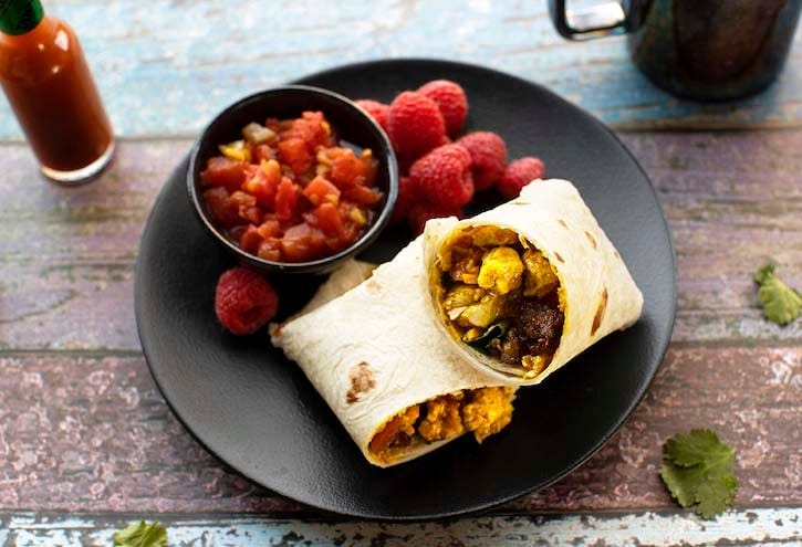 Vegan breakfast burritos with vegan sausage and tofu