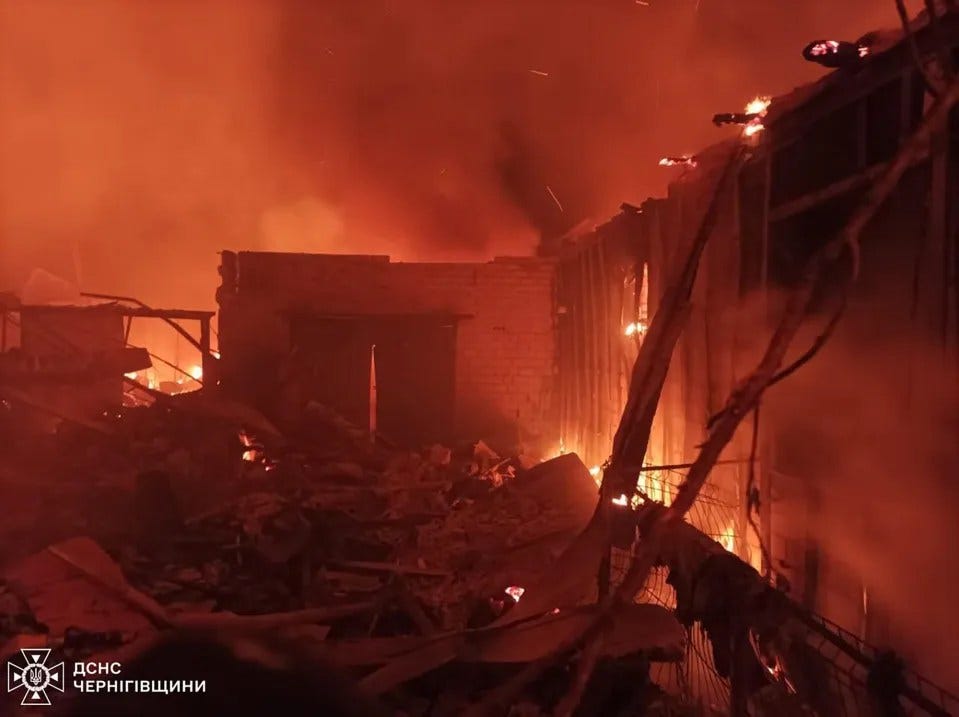 A building engulfed in flames.