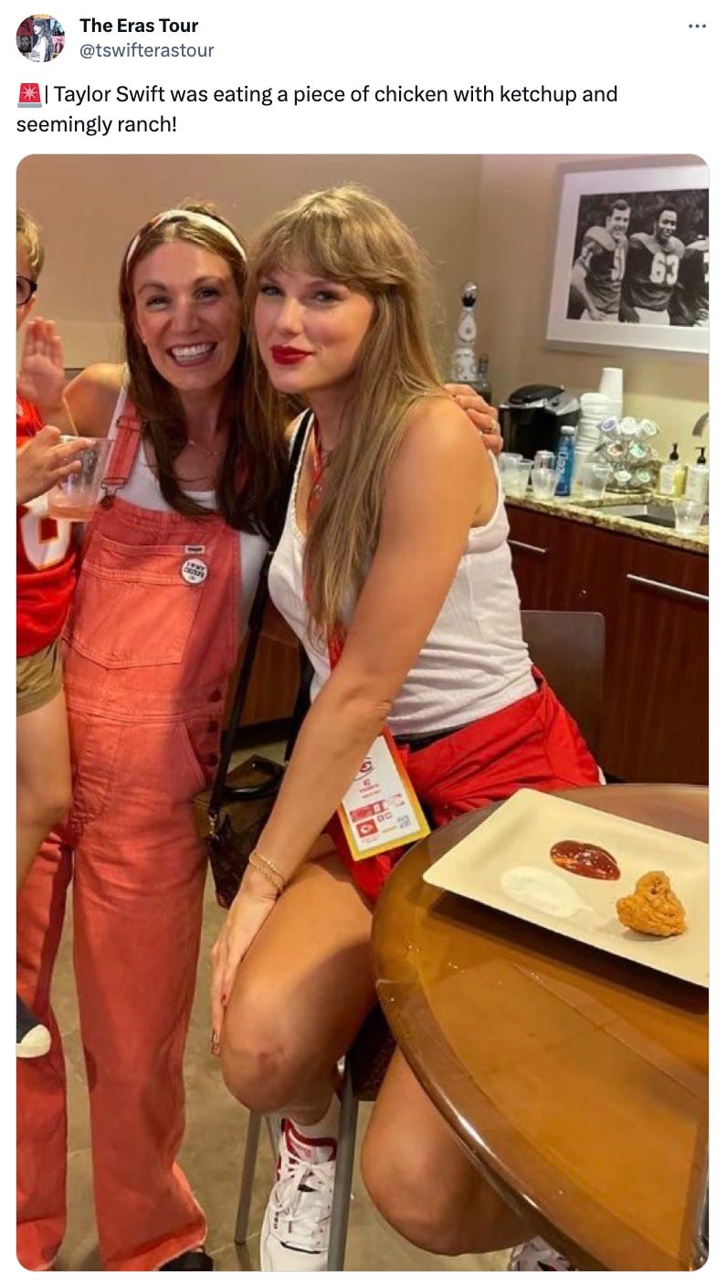  a tweet, sorry post on X, with a picture of Taylor Swift and a fan in a green room next to a plate with a chicken nugget on it captioned “🚨| Taylor Swift was eating a piece of chicken with ketchup and seemingly ranch!”