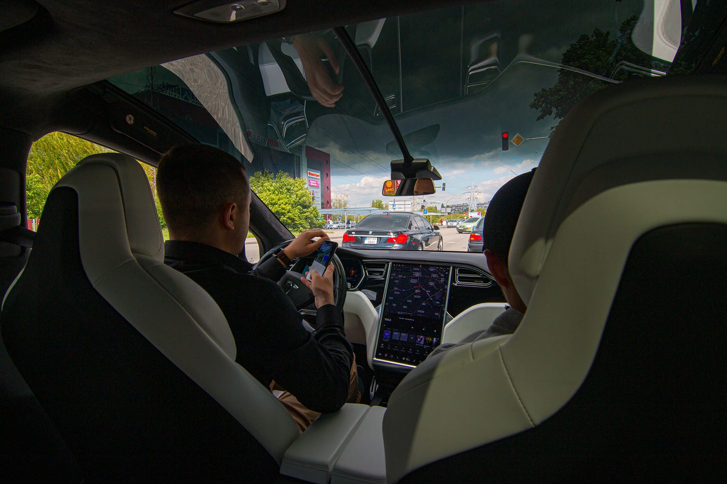 People driving a Tesla