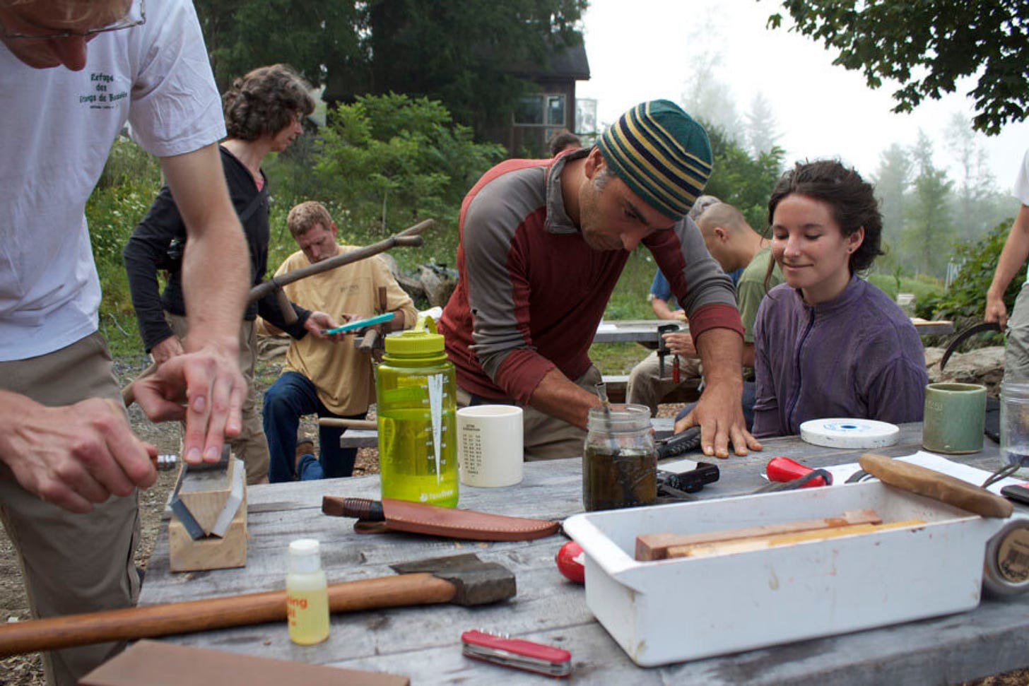 Ben sharing hands-on permaculture knowledge with students.