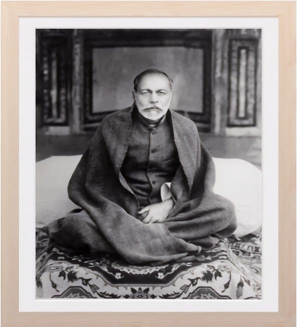 A person sitting on a bed

Description automatically generated