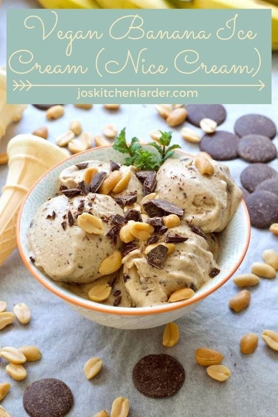 This may contain: vegan banana ice cream with chocolate chips in a bowl on a blue tablecloth