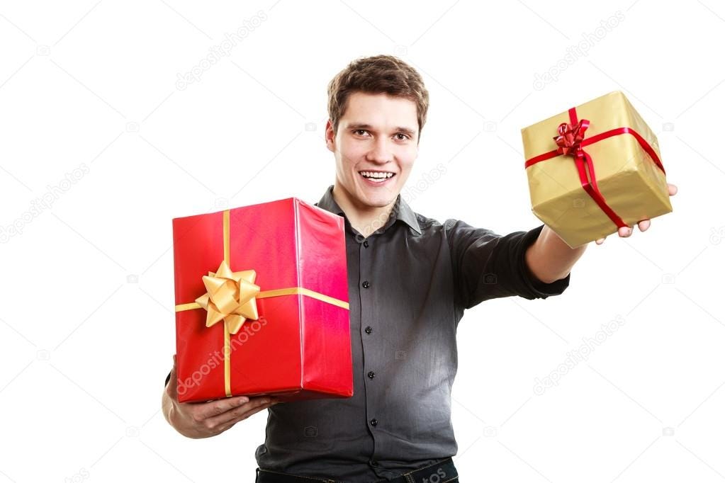Holiday. Young man giving presents gifts boxes Stock Photo by ©Voyagerix  43004843