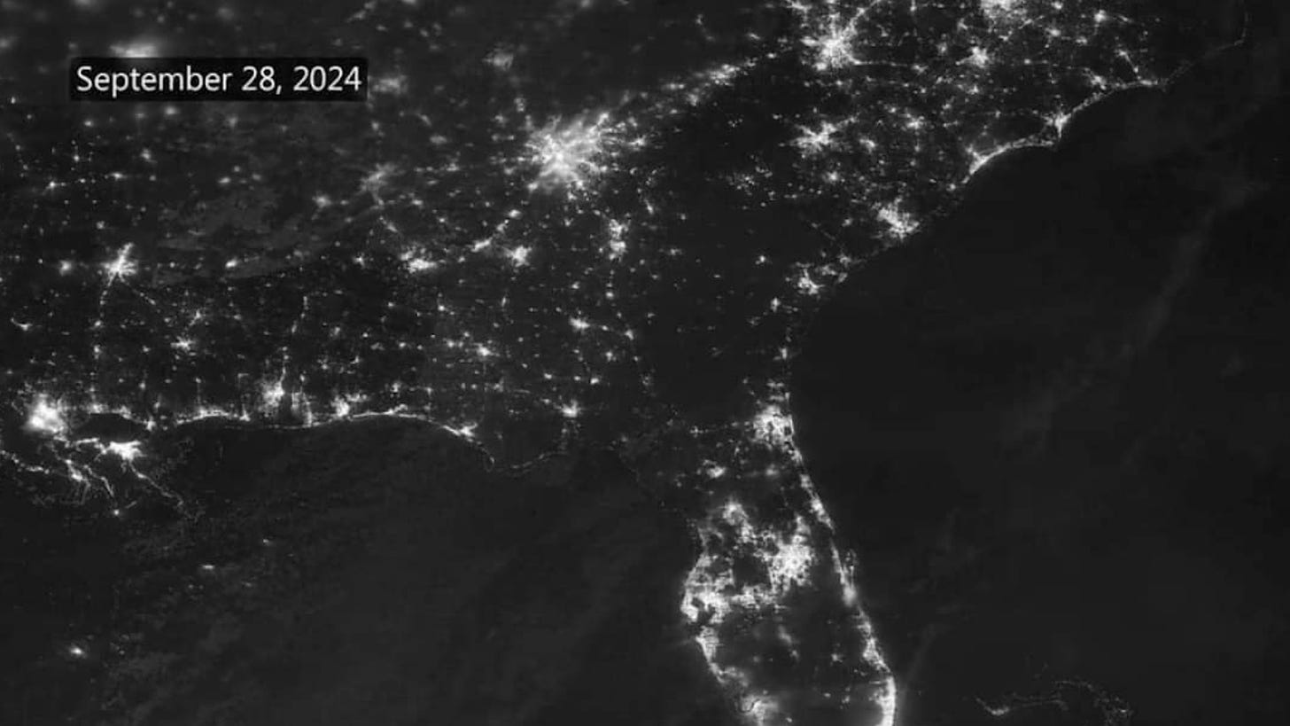 view of southeast US from space with visible power outages in hurricane Helene's path