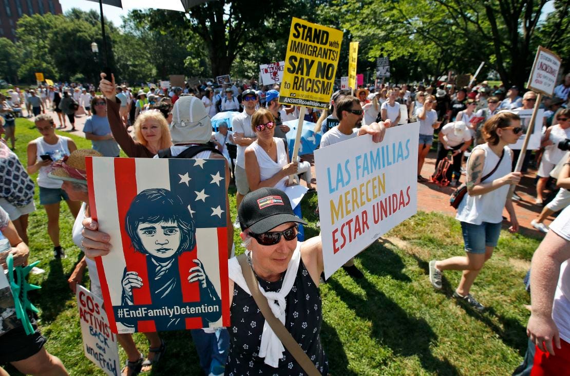 Activists protest the "zero tolerance" policy Saturday in Lafayette Square near the White House.