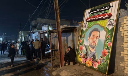 A picture of Ali Hassan al-Daraaji erected outside his family home in Baghdad.