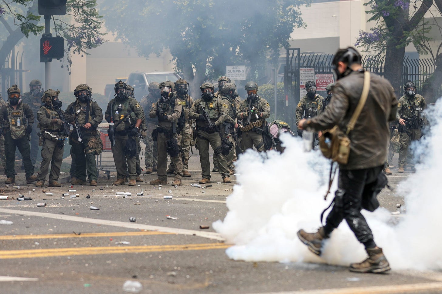 Federal agents fire flash-bang smoke grenades at protestors near a Home Depot after a raid was conducted by Immigration and Customs Enforcement (ICE) in Paramount, California, USA, 07 June 2025 Federal agents fire flash-bang smoke grenades at protestors near a Home Depot after a raid was conducted by Immigration and Customs Enforcement (ICE) in Paramount, California, USA, 07 June 2025