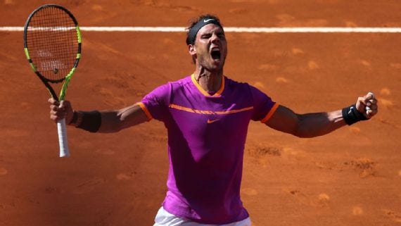 rafael nadal heads to madrid final after beating novak djokovic