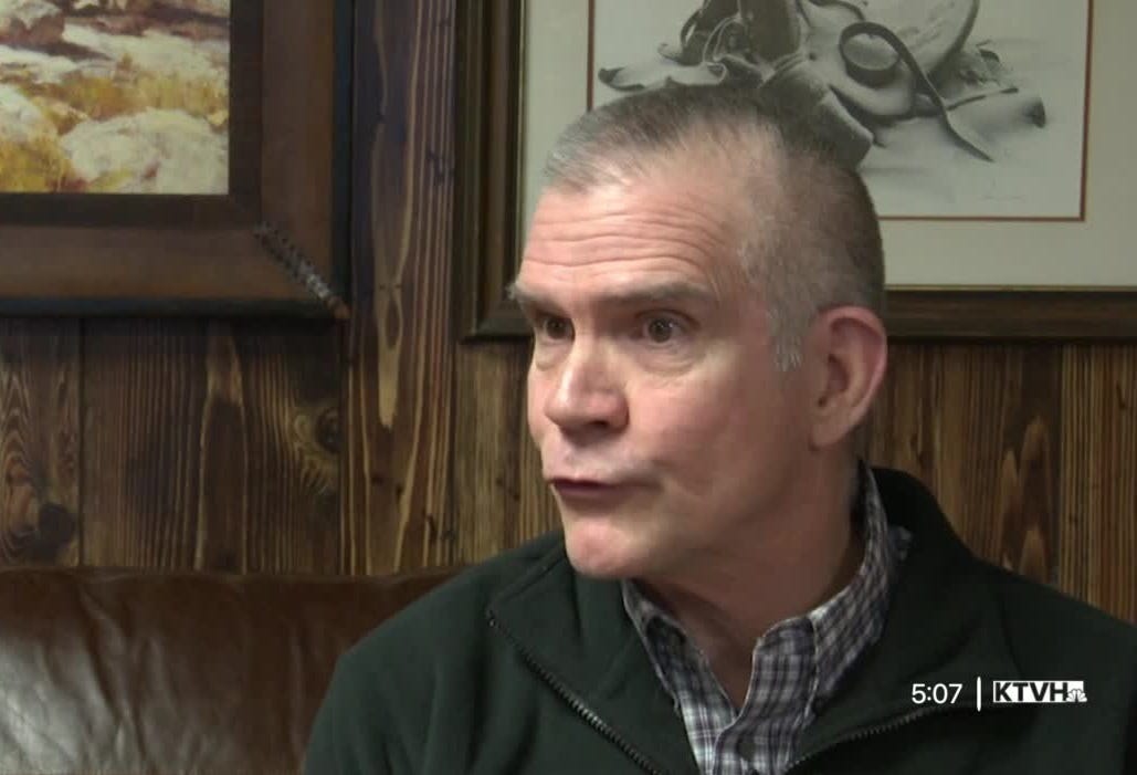 Local TV news screenshot of Rep. Matt Rosendale, his lips pursed. Obviously he was talking, but the picture makes him look like he has a goofy expression on his face. 