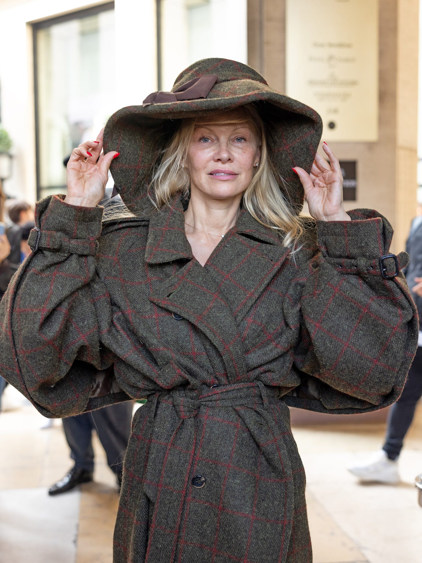 Pamela Anderson Goes Makeup-Free Throughout Paris Fashion Week