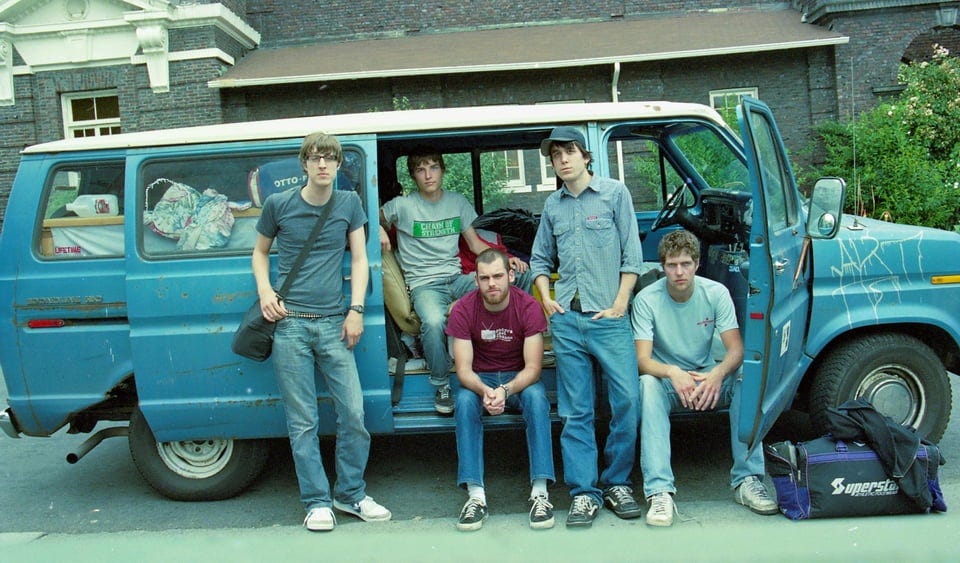 Go It Alone posing by their Van, West Coast Tour 2003