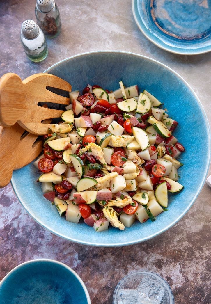 Potato and bean salad with artichokes and tomatoes