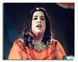 A person with her mouth open

Description automatically generated