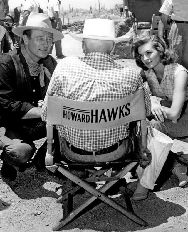 John Wayne, Howard Hawks and Angie Dickinson in the set of the American  Western film "Rio Bravo" (1959). Comments are welcome. : r/Colorization