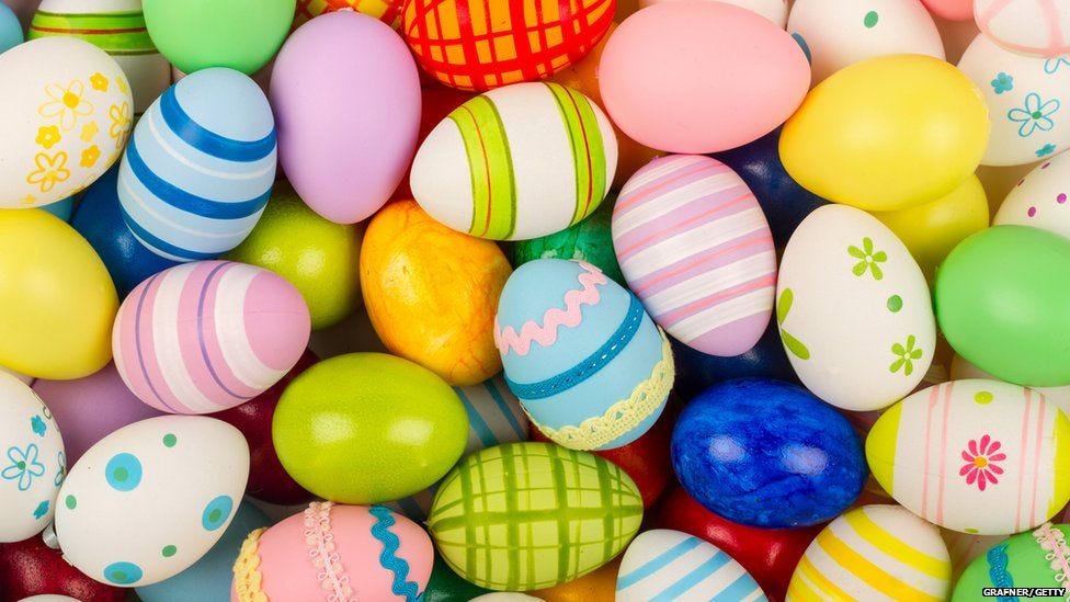 Image depicts an abundance of brightly decorated Easter eggs in an assortment of colours