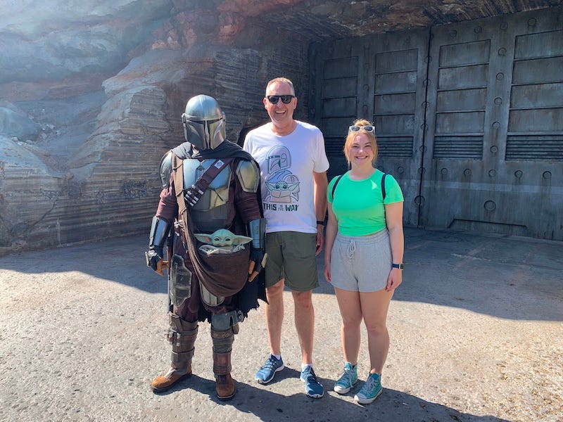 Dr. Dave and his daughter with the Mandalorian and Grogu