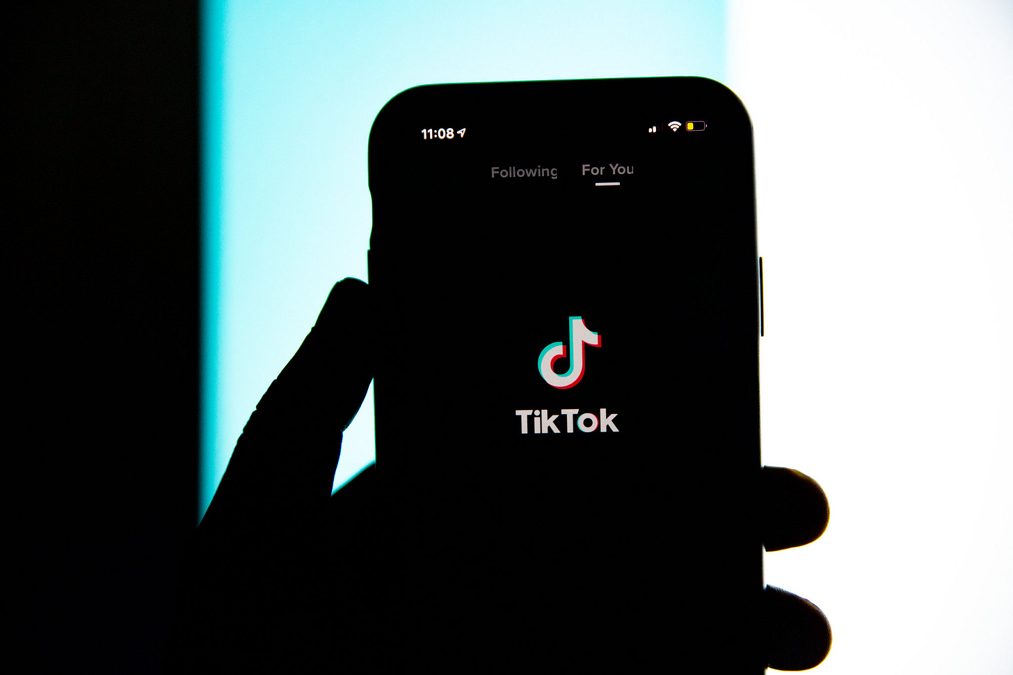 TikTok screen in shadow