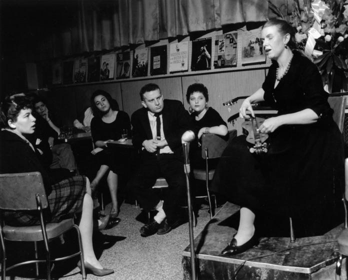 Jean Ritchie doing her set at opening night at Folk City, in Greenwich Village, New York City, photograph by George Pickow, courtesy Jean Ritchie and George Pickow