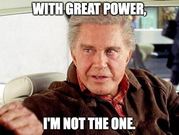 Still of Uncle Ben from Spider Man (2002) sitting in the Delta 88 giving his “with great power” speech, captioned “With great power, I’m not the one.” 
