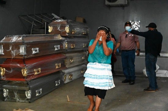 A woman cries at a court morgue in Honduras.