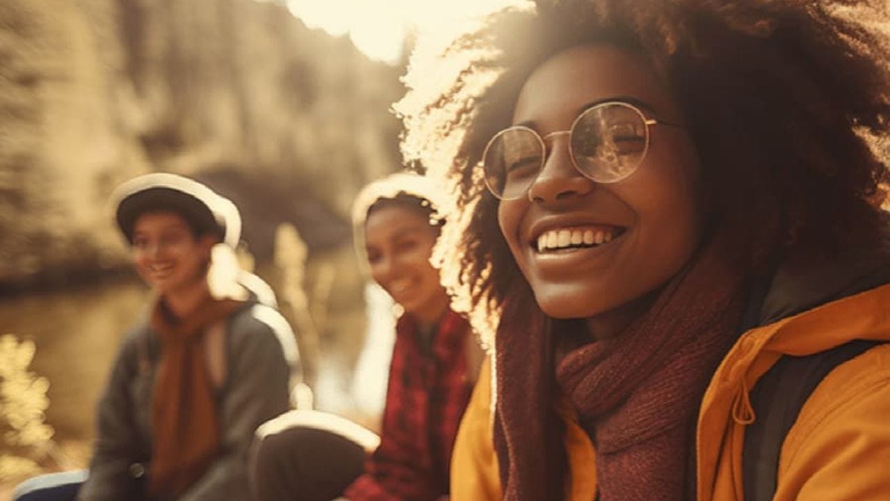 smiling women from post How Mental health and emotional wellbeing are not just from our brain