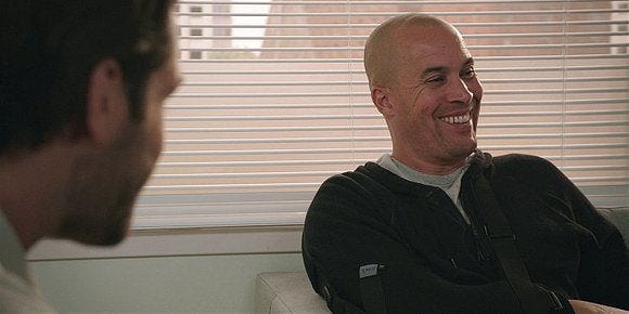 Walker James Coby Bell smiling wide.