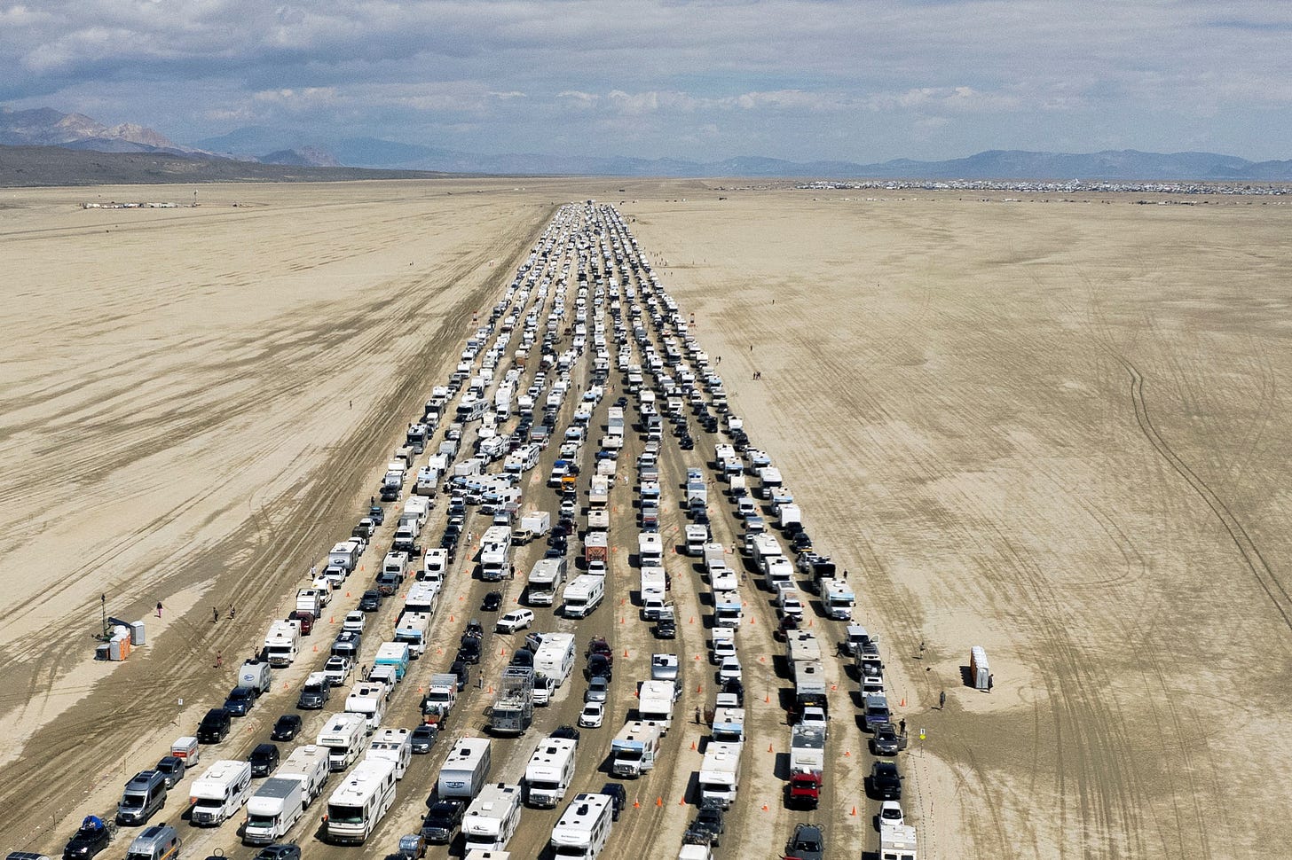 Burning Man festival road reopens, allowing thousands to escape muddy trap  | Reuters
