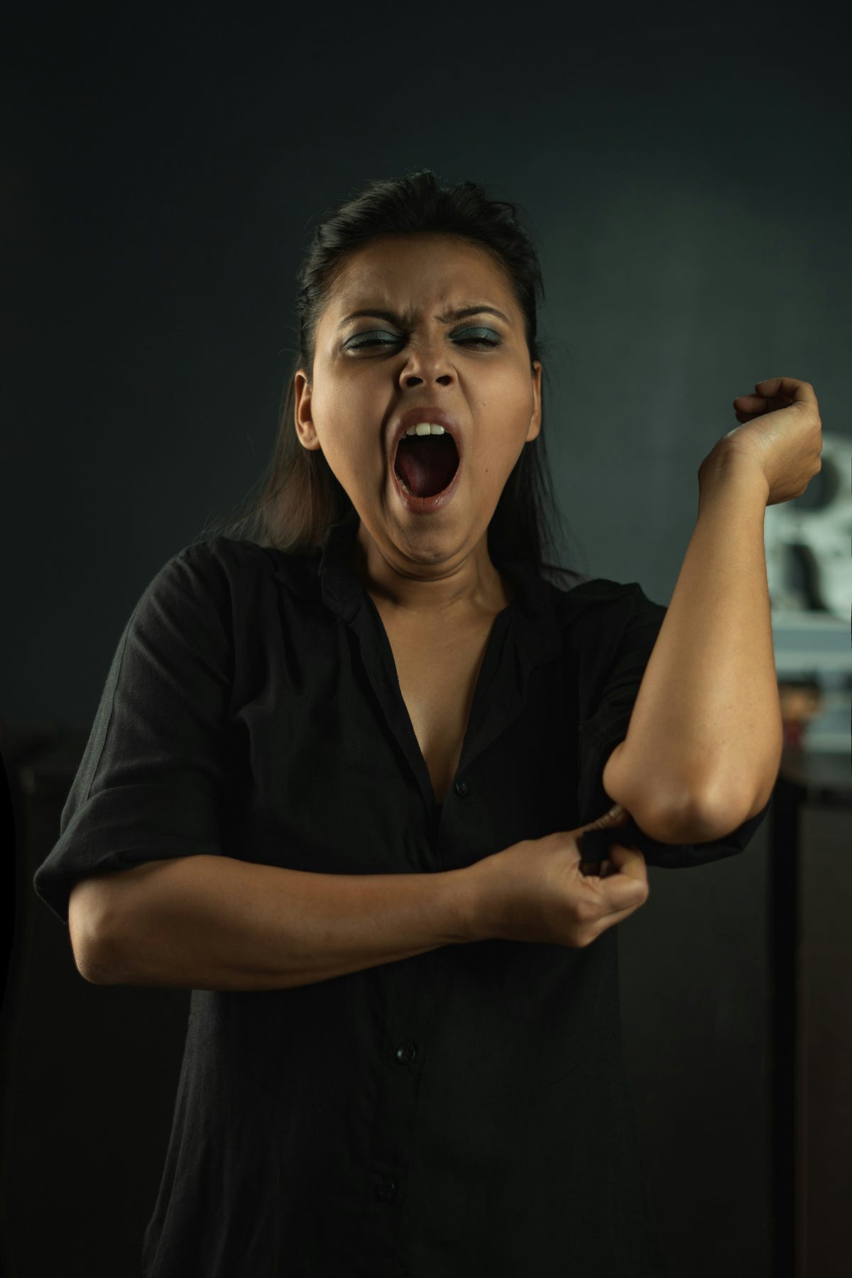 Tired woman yawns Tired woman yawns