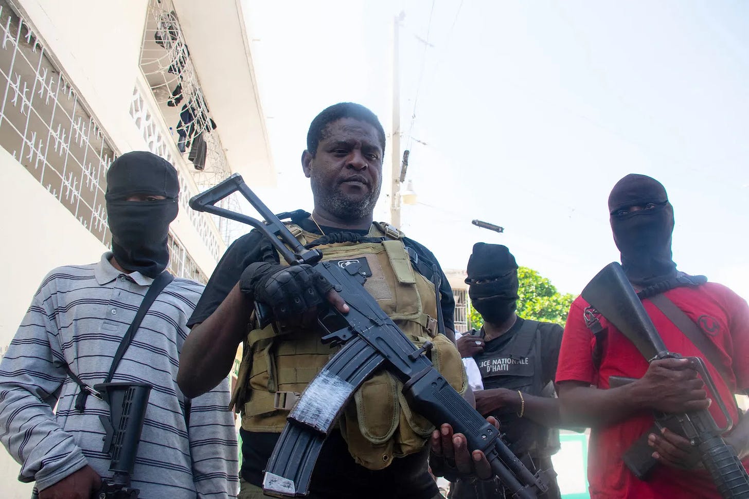 Armed gang leader Jimmy “Barbecue” Chérizier and his men are seen in Haiti.