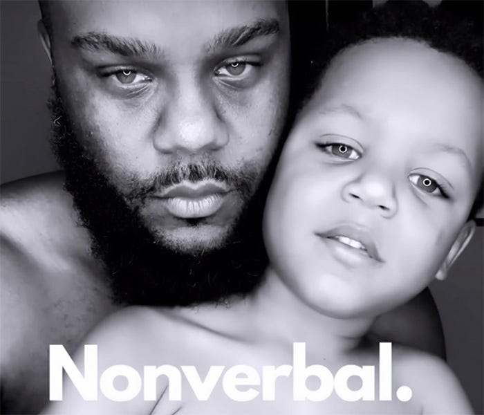 A Black father and his child are glowing in a black and white photo with the word Nonverbal.