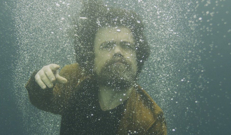 Peter Dinklage goes underwater in “She Came to Me.”