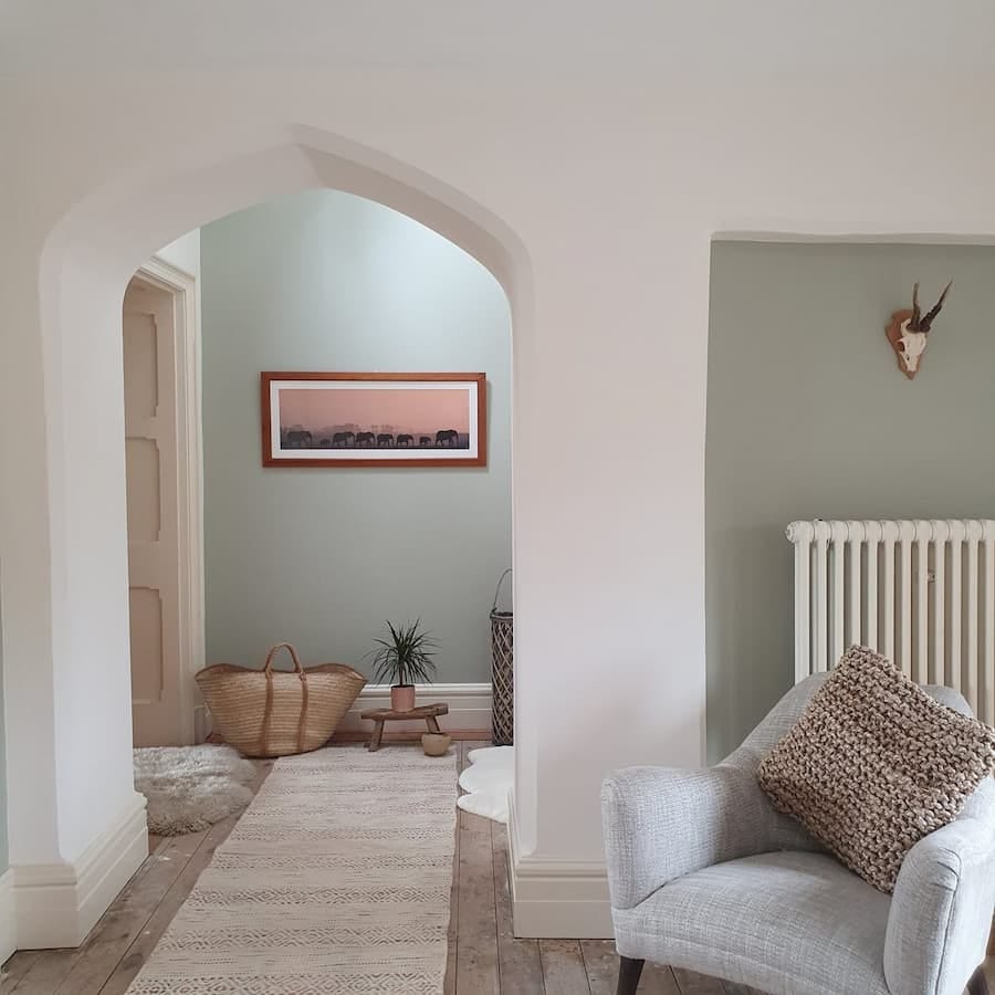 light and airy hallway of the old mansion which has been renovated in a beautiful modern design