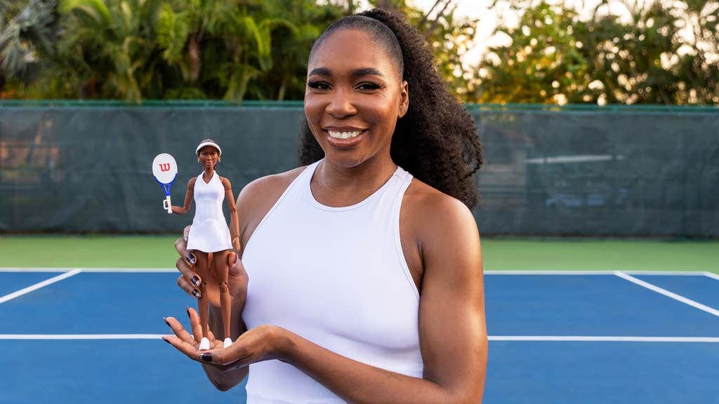 US Tennis Player Venus Williams poses with Barbie doll