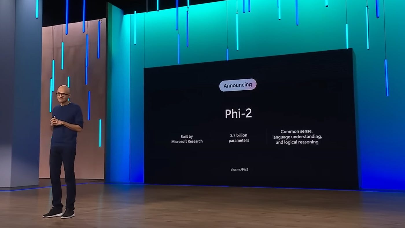 Satya Nadella on stage at Microsoft Ignite 2023 announcing Phi-2.