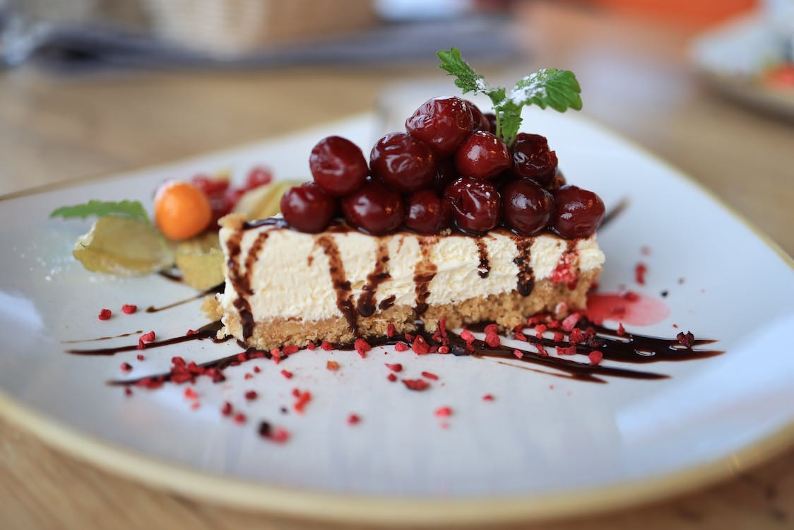 Free A Cheesecake with Cherries on Top Stock Photo