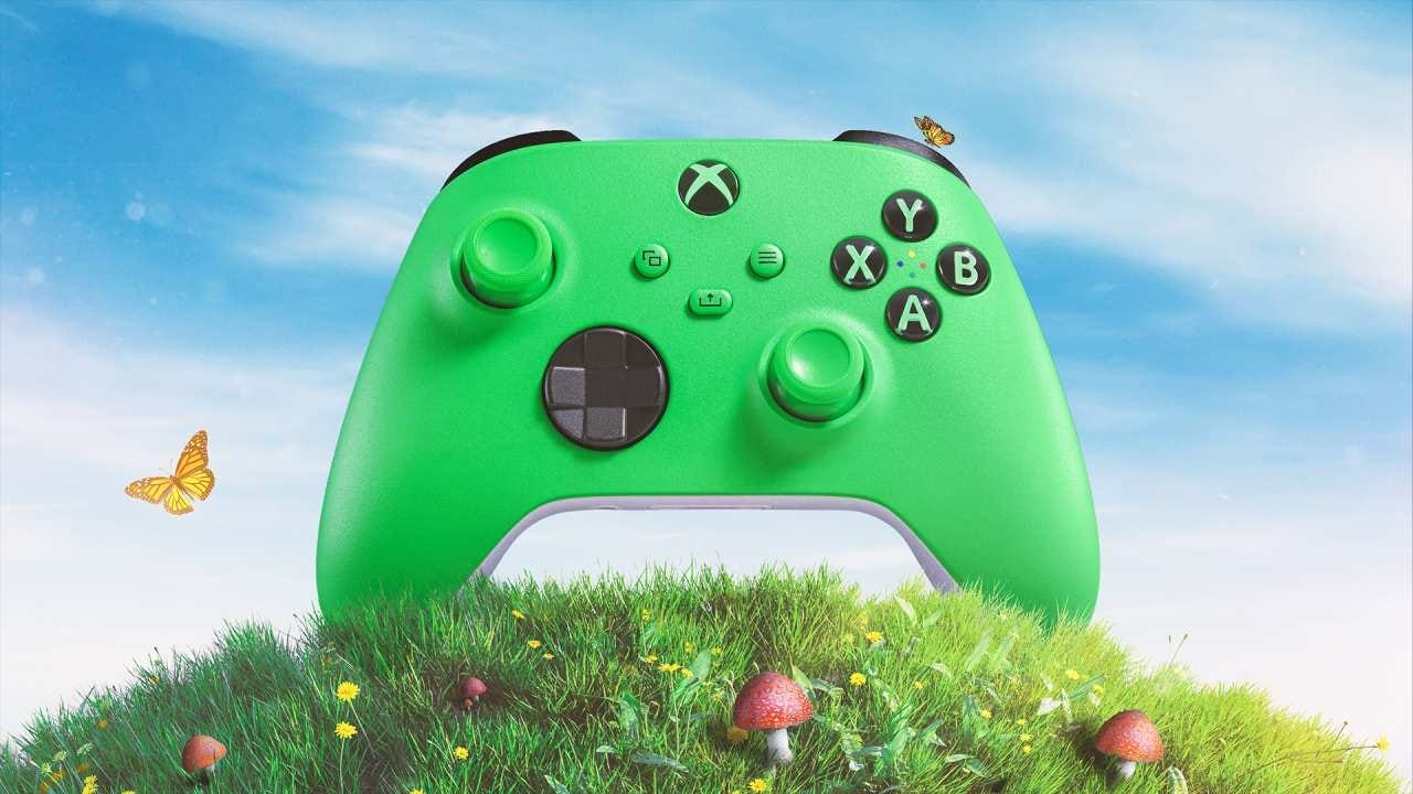 A Velocity Green Xbox controller on top of a grassy hill