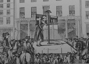 Christopher Atkinson, convicted of fraud, is shown walking around the pillory in front of the corn exchange.  His hat has been removed and placed on top of a central pole, around which the pillory turned.  He is surrounded by constables with staves and spectators, both on the street and looking through nearby windows.