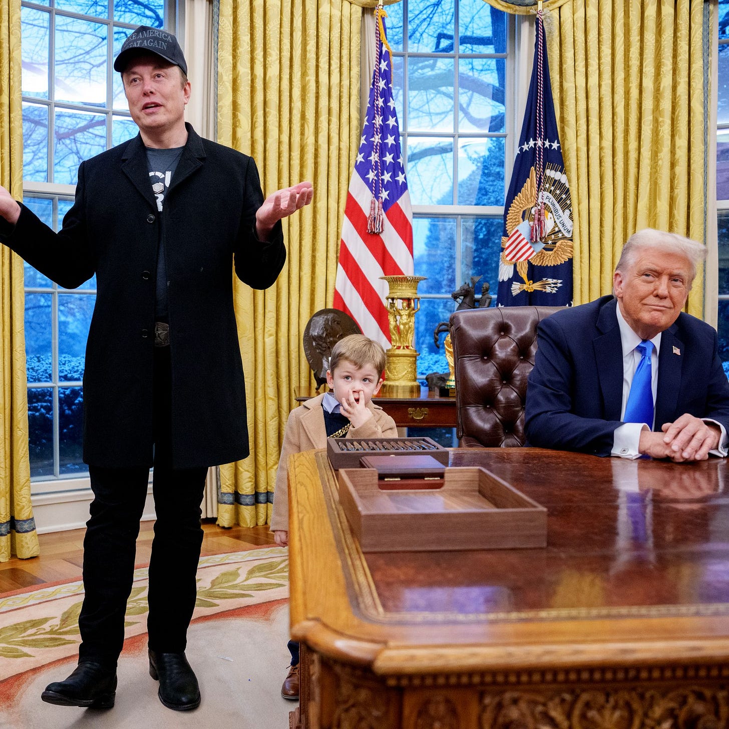 Fake video of Trump kissing Musk's feet blasts in HUD building