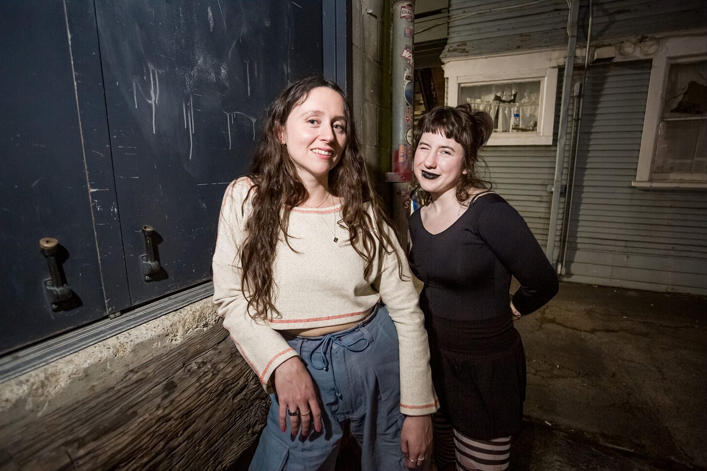 Photograph of two women facing the camera and smiling.