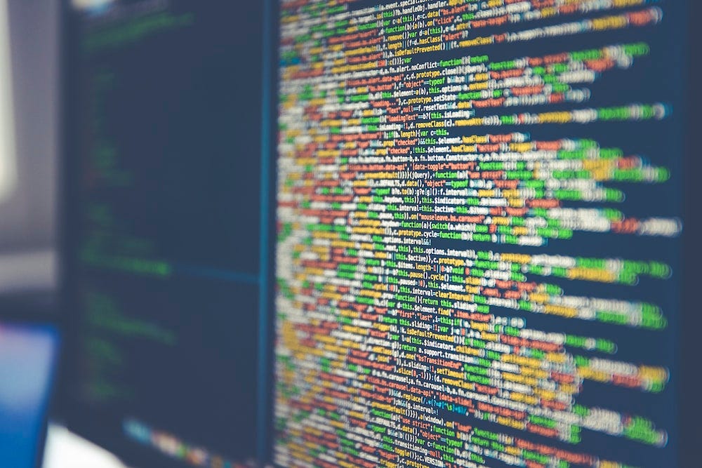 Colorful software or web code on a computer monitor Colorful software or web code on a computer monitor