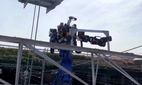 West Japan Railway has introduced a 12-metre high robot mounted on a truck to perform maintenance work on rails, including trimming tree branches and painting. 