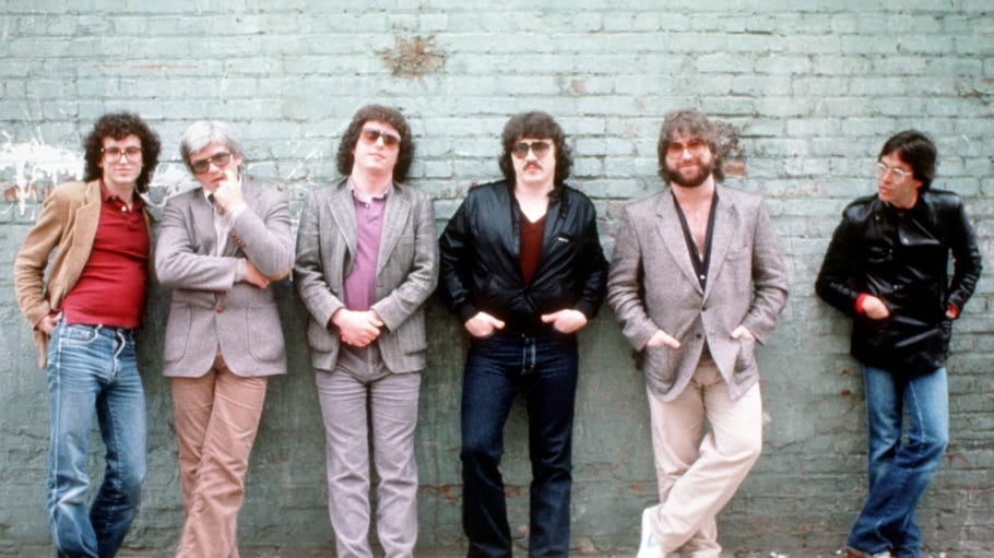 LOS ANGELES - MAY 1982:  Rock group Toto (L-R Steve Porcaro, David Hungate, Steve Lukather, Bobby Kimball, David Paich and Jeff Porcaro) pose for a portrait in May 1982 in los Angeles, California (Photo by Michael Ochs Archives/Getty Images)