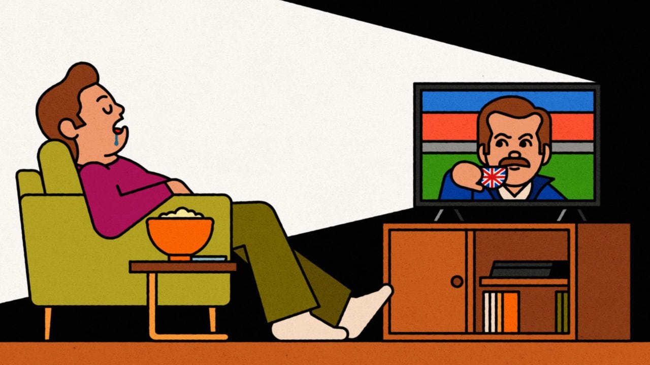 A man falling asleep watching modern TV